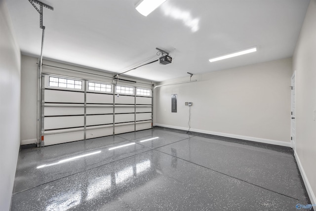 garage with electric panel, baseboards, and a garage door opener