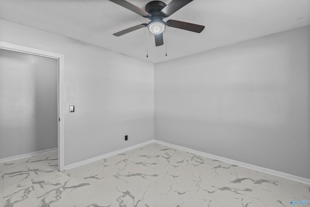 unfurnished room featuring ceiling fan