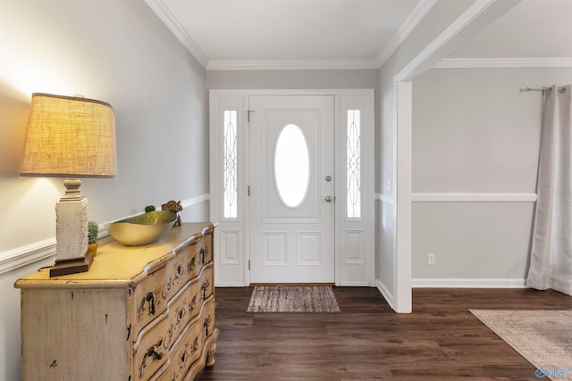 foyer with dark hardwood / wood-style flooring and ornamental molding