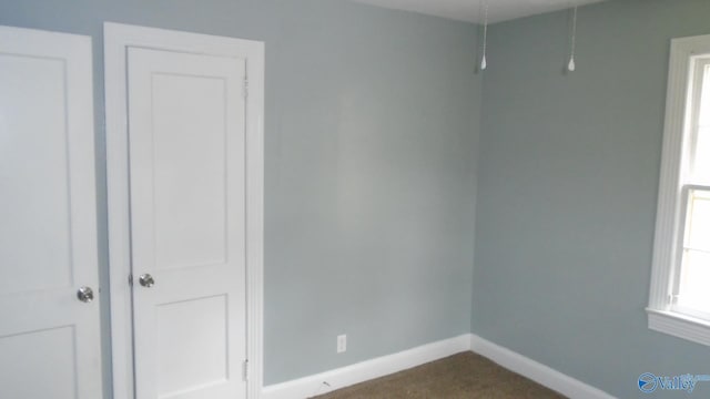 empty room with carpet floors