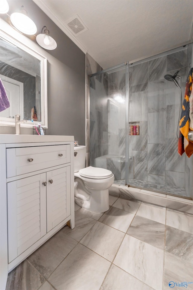 207 Sharp Dr, Gadsden, AL 35903 - bathroom with vanity, toilet, a shower stall, marble finish floors, and ornamental molding