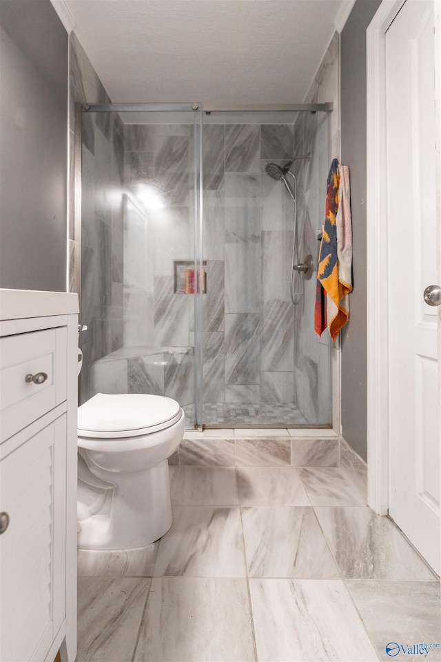207 Sharp Dr, Gadsden, AL 35903 - full bath featuring a stall shower, vanity, toilet, and marble finish flooring