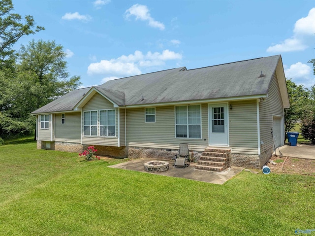 207 Sharp Dr, Gadsden, AL 35903 - rear view of property with crawl space, entry steps, a lawn, and an outdoor fire pit