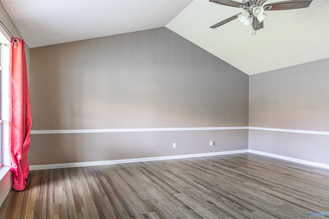 207 Sharp Dr, Gadsden, AL 35903 - additional living space featuring vaulted ceiling, a ceiling fan, wood finished floors, and baseboards