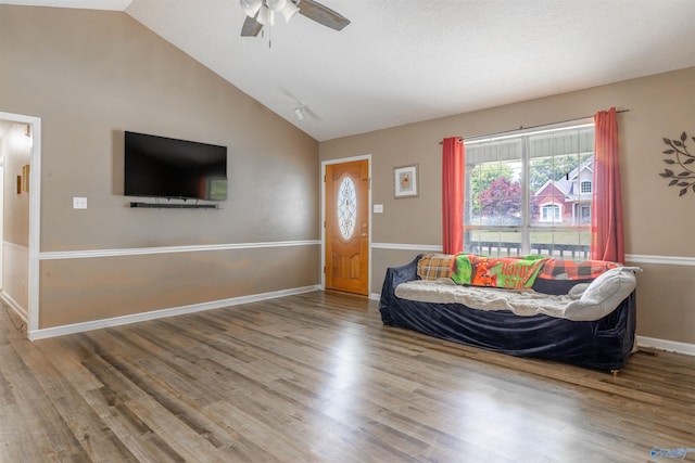 207 Sharp Dr, Gadsden, AL 35903 - living area with lofted ceiling, wood finished floors, a ceiling fan, and baseboards