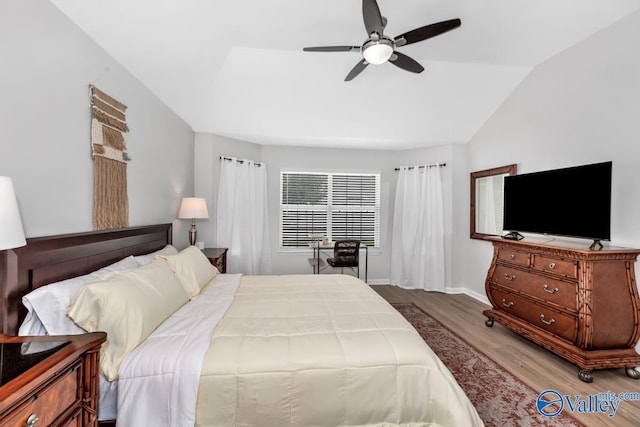 110 SW Cotton Bend Dr, Huntsville, AL 35824 - bedroom featuring wood finished floors, vaulted ceiling, baseboards, and ceiling fan