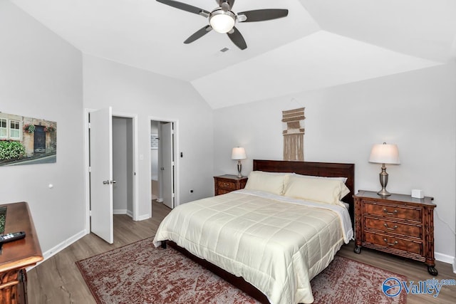 110 SW Cotton Bend Dr, Huntsville, AL 35824 - bedroom featuring wood finished floors, vaulted ceiling, baseboards, and ceiling fan