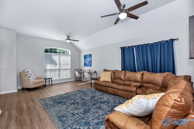 110 SW Cotton Bend Dr, Huntsville, AL 35824 - living room featuring a ceiling fan, vaulted ceiling, wood finished floors, and baseboards