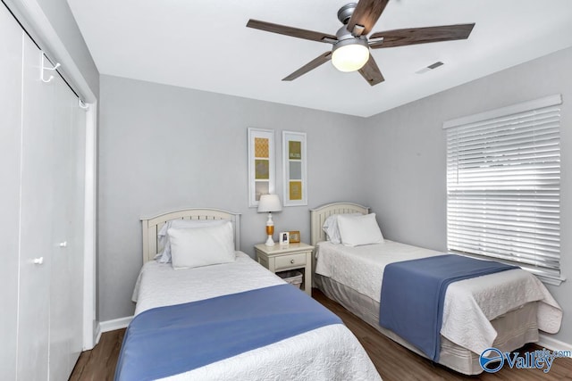 110 SW Cotton Bend Dr, Huntsville, AL 35824 - bedroom featuring a closet, wood finished floors, and ceiling fan