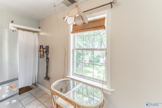 3516 Oleander Rd SW, Huntsville, AL 35805 - bathroom featuring tile patterned floors, baseboards, curtained shower, and visible vents