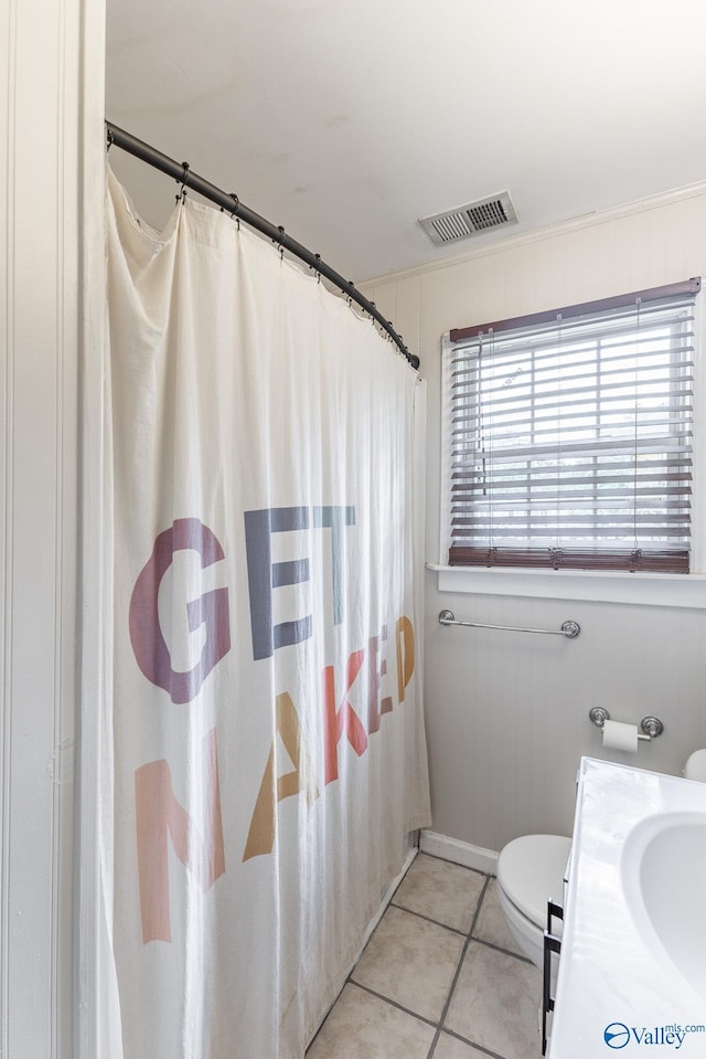 3516 Oleander Rd SW, Huntsville, AL 35805 - full bathroom featuring vanity, toilet, tile patterned floors, a shower with curtain, and visible vents