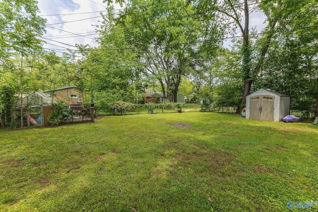 3516 Oleander Rd SW, Huntsville, AL 35805 - view of yard featuring an outbuilding and a shed
