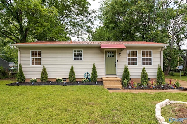 3516 Oleander Rd SW, Huntsville, AL 35805 - view of front facade featuring a front yard, metal roof, and crawl space
