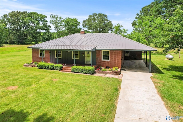 ranch-style house with covered porch, a carport, and a front yard