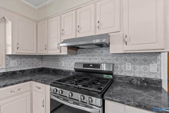 kitchen with dishwasher, white cabinets, and light tile patterned floors