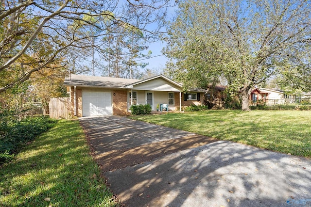 ranch-style home with a front lawn, driveway, fence, brick siding, and an attached garage