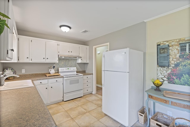 kitchen with white cabinets, tasteful backsplash, a sink, and white appliances