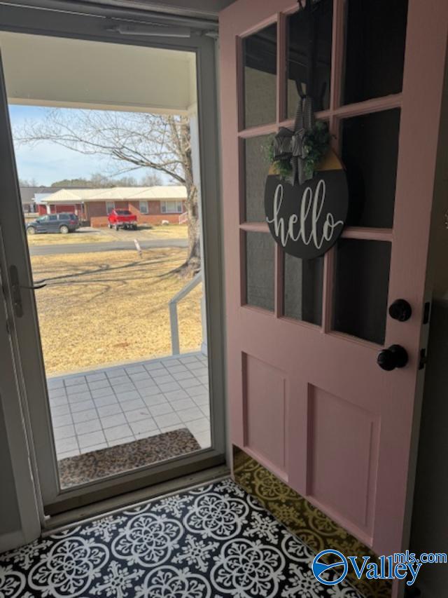 interior space with tile patterned flooring