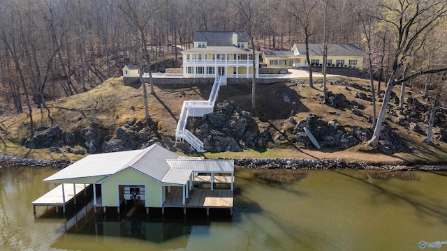 1204 Sibert Dr, Glencoe, AL 35905 - dock area with boat lift, a water view, stairs, and a wooded view