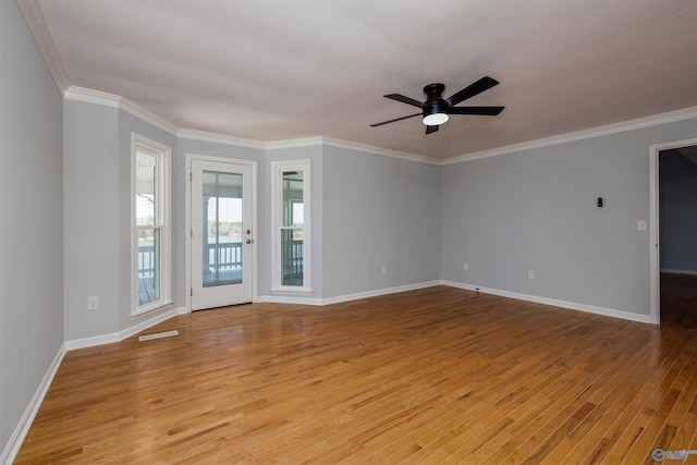 1204 Sibert Dr, Glencoe, AL 35905 - spare room featuring light wood finished floors, baseboards, a ceiling fan, and crown molding