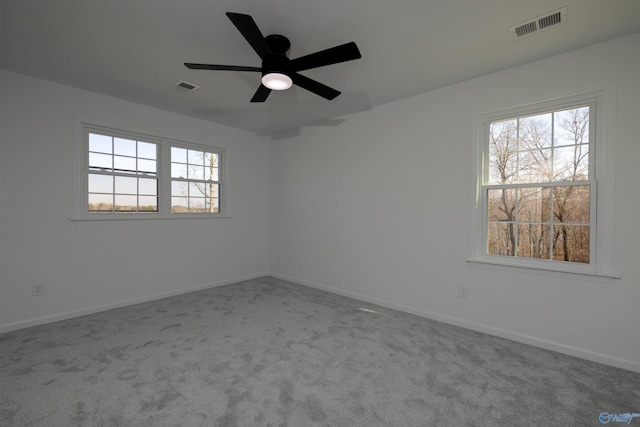 1204 Sibert Dr, Glencoe, AL 35905 - unfurnished room with carpet floors, baseboards, and a ceiling fan