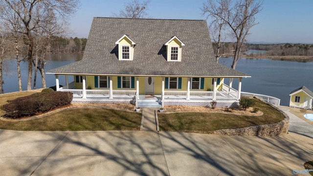 1204 Sibert Dr, Glencoe, AL 35905 - country-style home with a water view, a porch, roof with shingles, and a front lawn