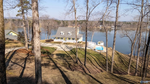 1204 Sibert Dr, Glencoe, AL 35905 - back of property featuring a water view, covered porch, and a yard