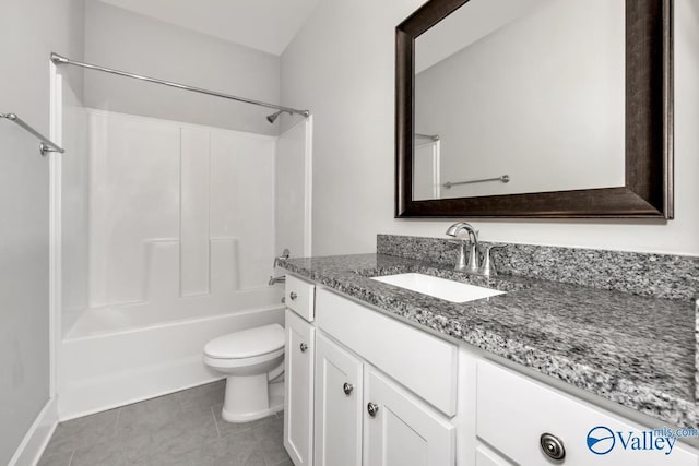 full bathroom featuring tile patterned flooring, vanity, bathtub / shower combination, and toilet