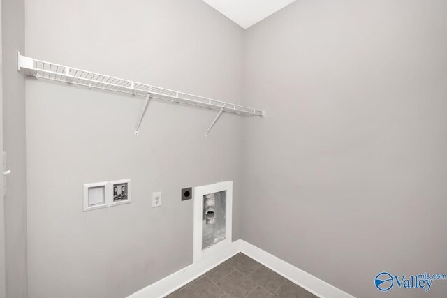 clothes washing area with hookup for an electric dryer and hookup for a washing machine