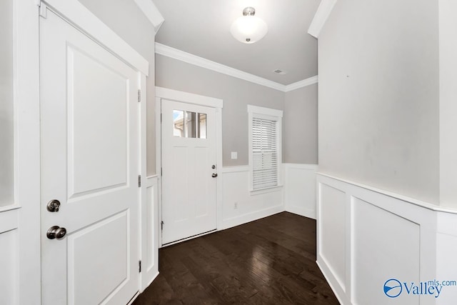 entryway featuring dark hardwood / wood-style floors and ornamental molding