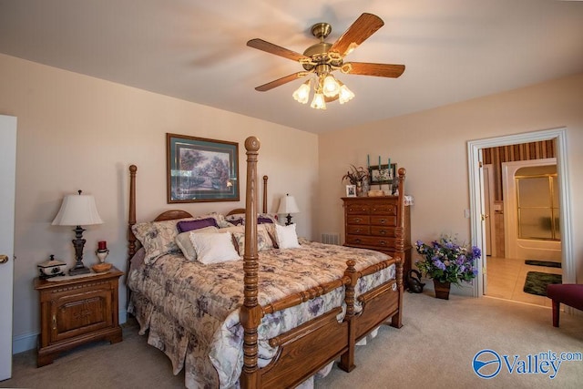 carpeted bedroom featuring ceiling fan