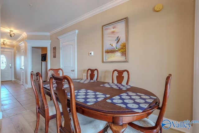 5590 Bay Hill Dr Unit 303, Athens, AL 35611 - dining room featuring crown molding and light tile patterned flooring