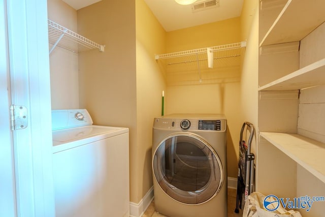 5590 Bay Hill Dr Unit 303, Athens, AL 35611 - laundry room featuring washing machine and dryer