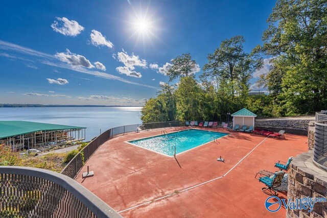 5590 Bay Hill Dr Unit 303, Athens, AL 35611 - community pool with a water view and a patio