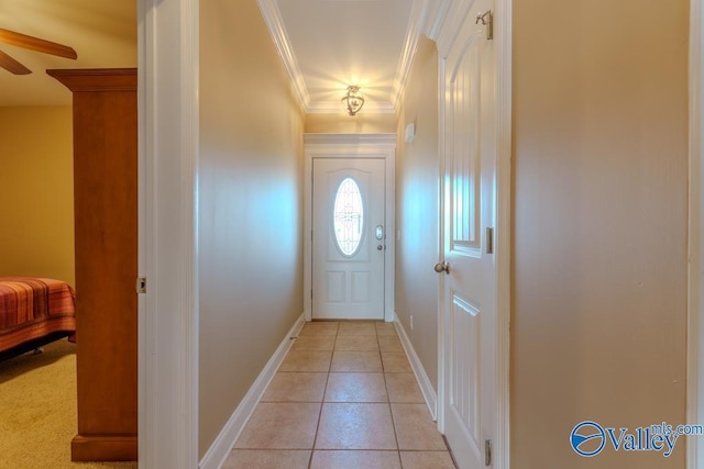 5590 Bay Hill Dr Unit 303, Athens, AL 35611 - entryway with light tile patterned floors, ornamental molding, ceiling fan, and baseboards