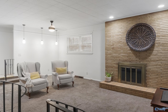 living room featuring a brick fireplace and carpet floors