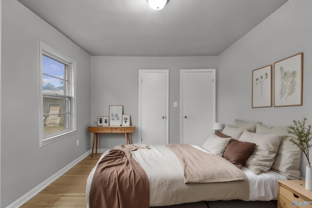 bedroom featuring light hardwood / wood-style flooring