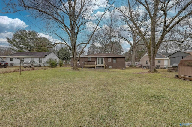 view of yard with a wooden deck