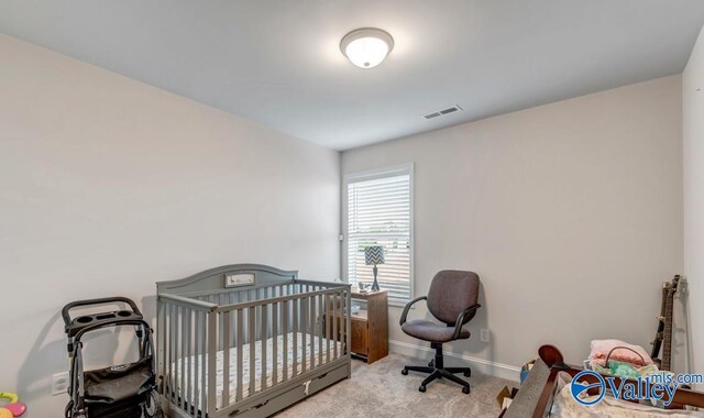193 Cherry Laurel Dr, Hazel Green, AL 35750 - carpeted bedroom featuring baseboards and a nursery area