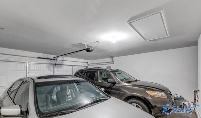 193 Cherry Laurel Dr, Hazel Green, AL 35750 - garage featuring a garage door opener