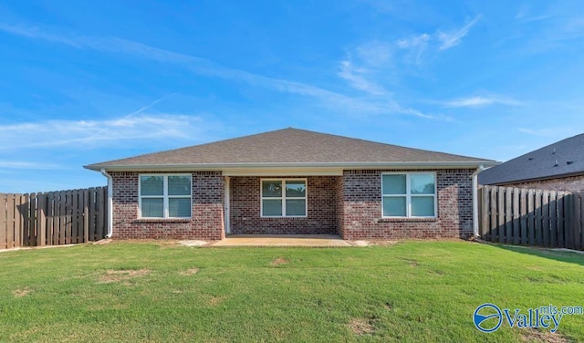 193 Cherry Laurel Dr, Hazel Green, AL 35750 - back of property with brick siding and a patio area