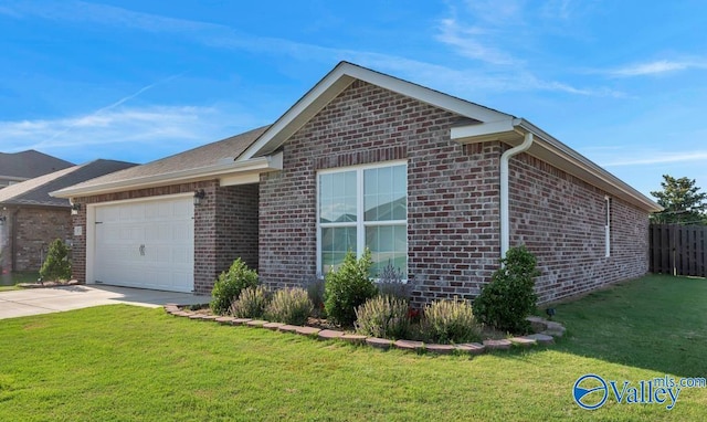 193 Cherry Laurel Dr, Hazel Green, AL 35750 - ranch-style house featuring brick siding, an attached garage, and concrete driveway