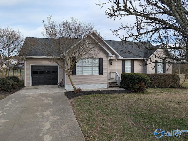 single story home with roof with shingles, concrete driveway, an attached garage, crawl space, and a front lawn