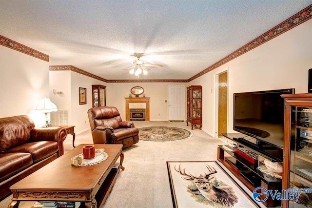 25000 Union Hill Rd, Ardmore, TN 38449 - living area featuring carpet floors, baseboards, a ceiling fan, and a textured ceiling