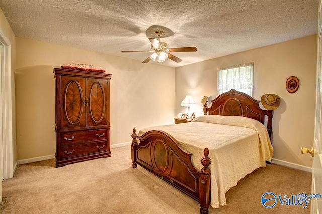 25000 Union Hill Rd, Ardmore, TN 38449 - bedroom with baseboards, a textured ceiling, light colored carpet, and ceiling fan