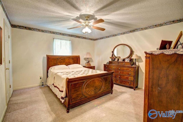 25000 Union Hill Rd, Ardmore, TN 38449 - bedroom featuring a textured ceiling, light colored carpet, and baseboards
