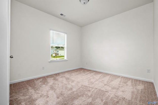 unfurnished room featuring carpet floors