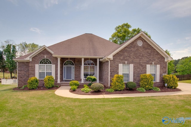 227 Lee Bowden Dr, Huntsville, AL 35806 - view of front of house featuring brick siding and roof with shingles