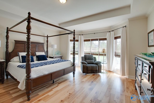 227 Lee Bowden Dr, Huntsville, AL 35806 - bedroom with light wood-style floors, crown molding, access to outside, and baseboards