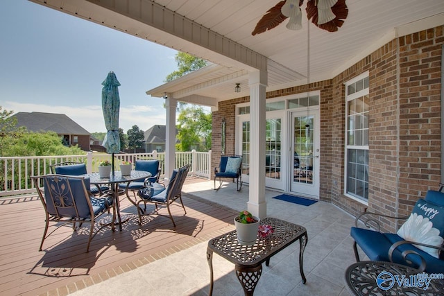 227 Lee Bowden Dr, Huntsville, AL 35806 - view of patio / terrace with ceiling fan, a wooden deck, and outdoor dining area
